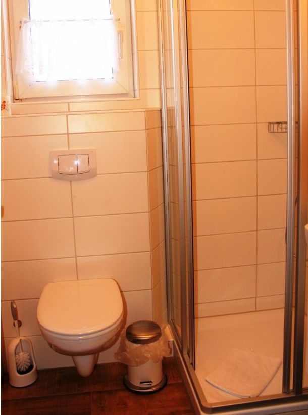 Ferienwohnung Tag am Meer – helles modernes Badezimmer