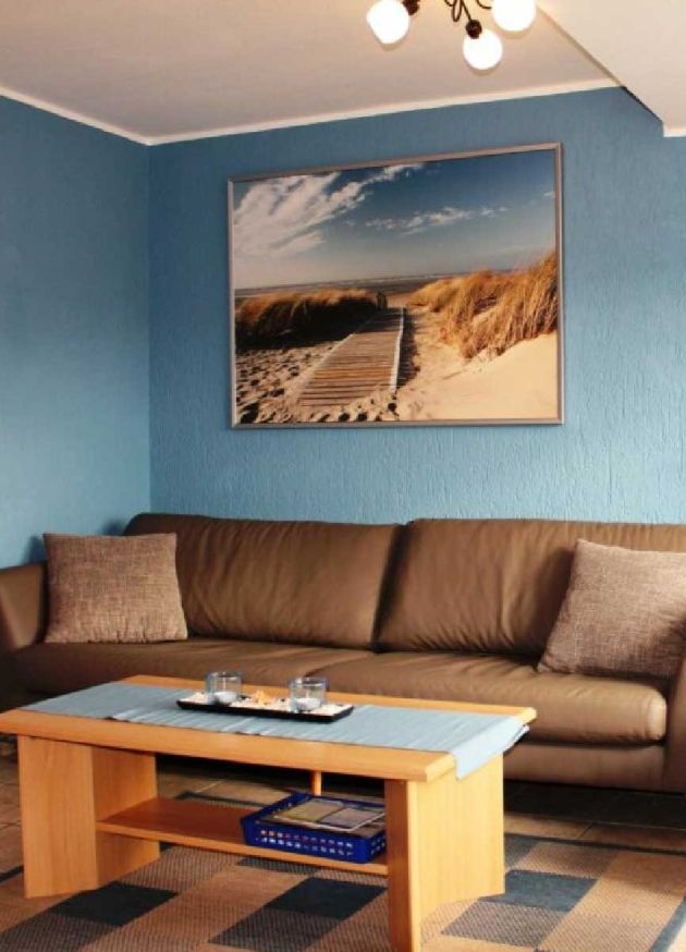 Wohnzimmer der Ferienwohnung Tag am Strand
